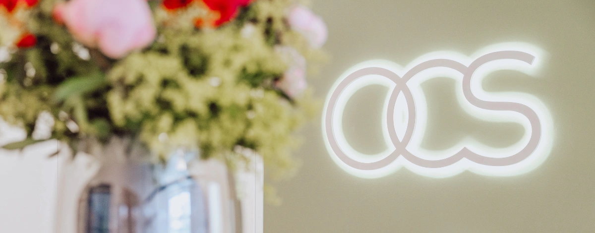 Oralchirurgie Stralsund Logo mit Blumen